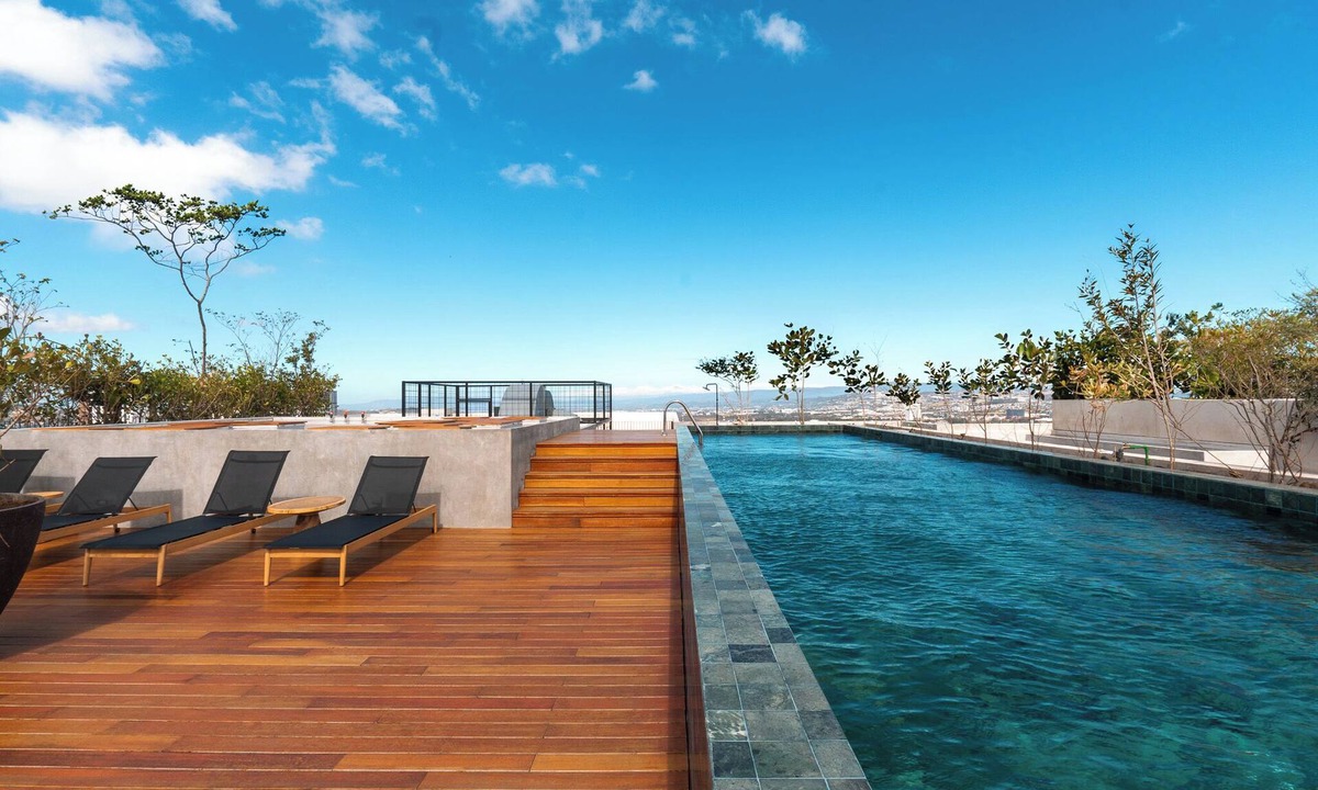 Rohrmoser Apartment | Brand NEW Stylish Apartment with heated pool, fully equipped gym and AC.