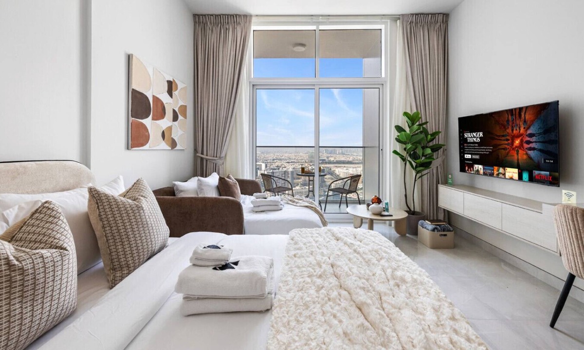 Al Barsha Apartment | Cozy Studio with 31st Floor Miracle Garden View