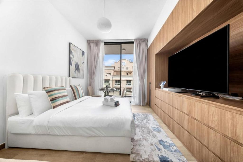 Jumeirah Village Apartment | Free housekeeping visits during your stay - StayShort - JVC Studio for 2 people with a Pool and Gym