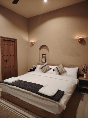 Nizwa House | Shwathina Inn نزل شواذنة