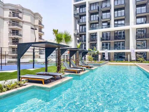 Al Barsha Apartment | Stylish modern studio near Miracle Garden with Gym, Pool and Padel court