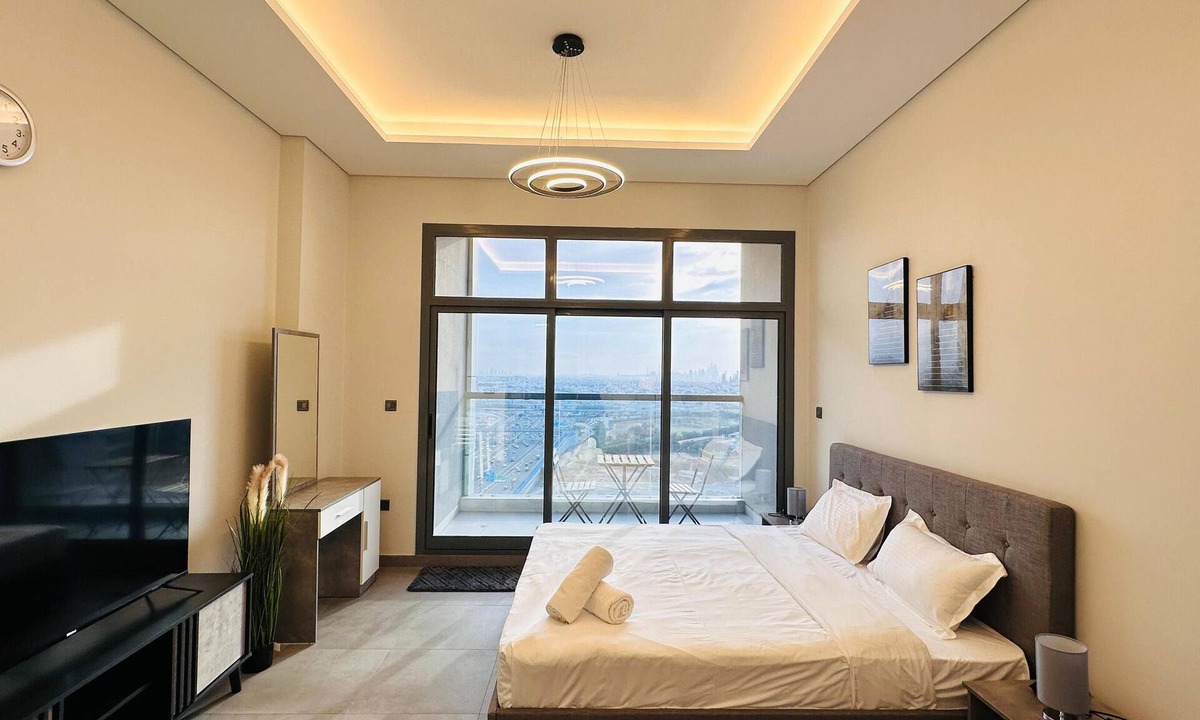 Business Bay Apartment | Upscale Apartment at Oval Tower Near Downtown with Balcony and Parking by Belvilla