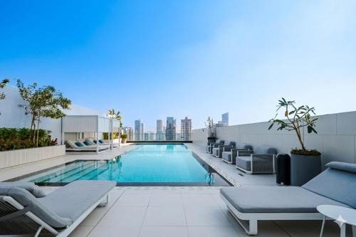 Jumeirah Village Circle Apartment | Vogue Vacation Homes, Luma Park Views JVC Near Circle Mall, Two Bedroom Apartment with Balcony, Park, City and Vibrant community View, Access to All Amenities