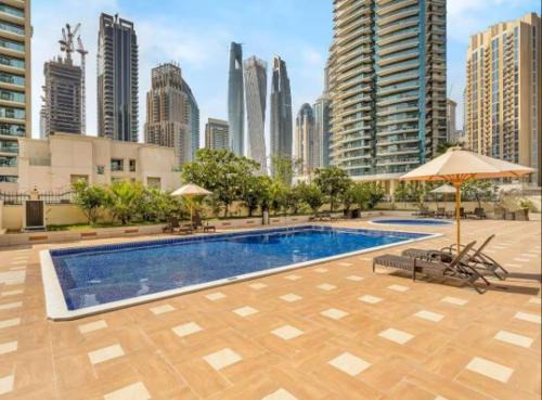 Dubai Marina Apartment | Vogue Vacation Homes, Marina Diamond Near JBR Beach and Marina Mall, Two Bedroom Apartment with Balcony and City View, Access to all Amenities, Walkable to Sobha Realty Metro Station and Bus Stop