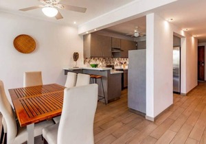 Elegant Condo with Brand-New Fixtures, Shaded Tropical Terrace, and Secluded Bea