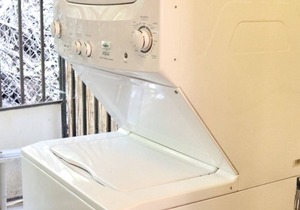 Refreshed 2 bedroom with Rooftop Terrace & BBQ