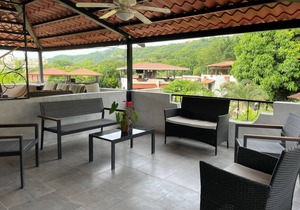 Two Bedroom condo with Great Roof Terrace and walking distance to the beach