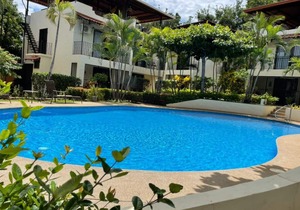 Two Bedroom condo with Great Roof Terrace and walking distance to the beach