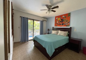 Two Bedroom condo with Great Roof Terrace and walking distance to the beach