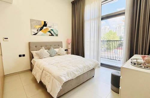 Al Muraqqabat Apartment | 1-bedroom apartment with AC in vibrant Dubai