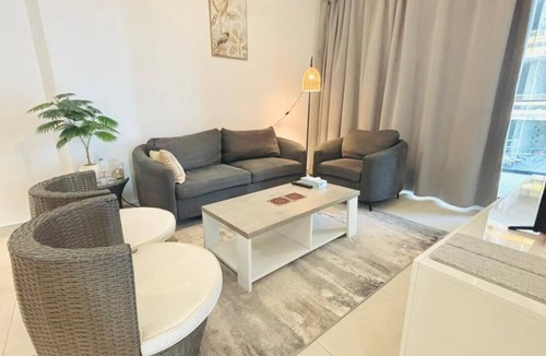 Al Muraqqabat Apartment | 1-bedroom apartment with AC in vibrant Dubai