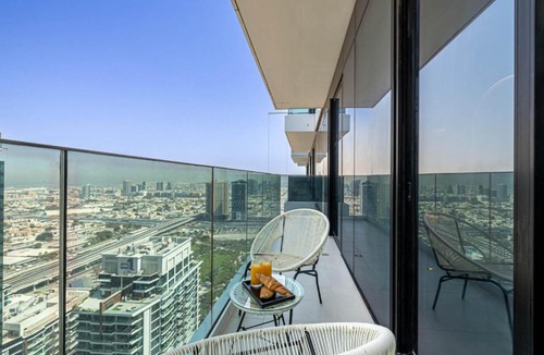Bur Dubai Apartment | 41st-Floor 2BR with World's Highest Running Track