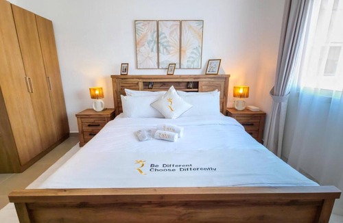 Abu Dhabi Apartment | Al Reef 1BR - Cozy Serene Luxe Retreat