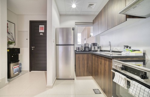 Dubai Ski Chalet | Alluring 3BR Townhouse at DAMAC Hills 2 Avencia by Deluxe Holiday Homes