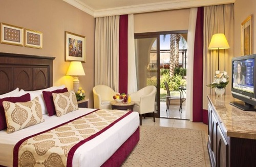 Al Aqah Hotel | An Upscale Elegant Room with Side Sea Views and Pool - Perfect for Vacation