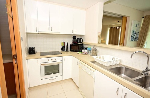 Al Raha Beach Apartment | Beachfront Beauty: 1BR Retreat for Your Getaway