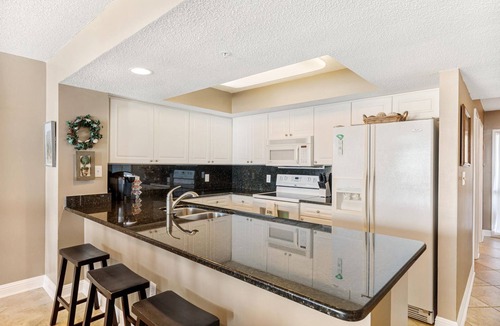 Folly Beach Condo | Beautiful Front Beach 4 Bedroom Condo with Private Parking and Pools