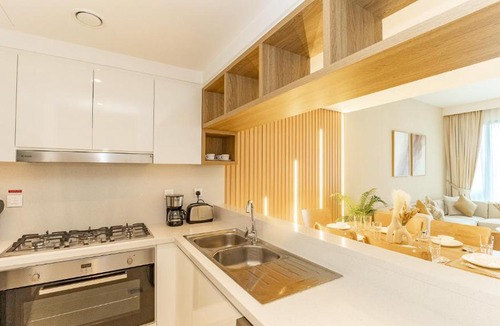 Bur Dubai Apartment | Burj Khalifa view with Grass Turf Balcony-Downtown by Tanami Holiday Homes