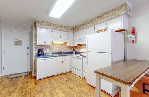 North Forest Beach Condo | Charming Condo 1 block from Coligny Plaza with on site pool, balcony, with Washer Dryer