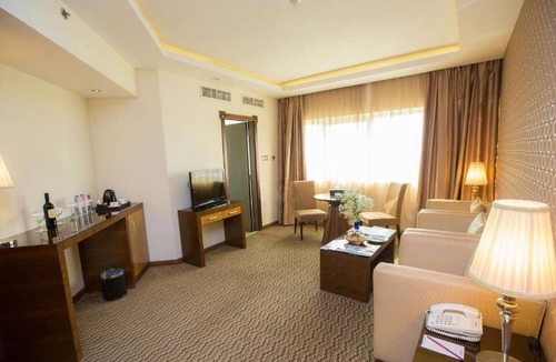 Al Qusais Apartment | Deluxe Room Near Tudomart By Luxury Bookings AC