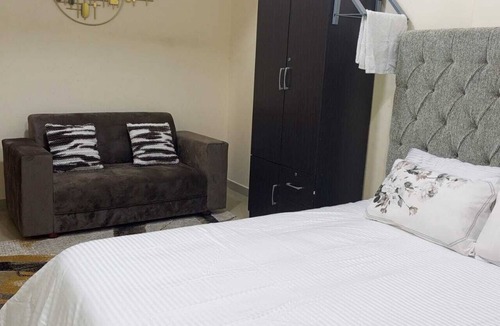 Mussafah Apartment | Escape to comfort 2-bedroom apartment with WiFi, AC in fabulous Abu Dhabi