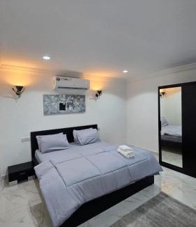 Al Ain Apartment | Family bedroom Jimi