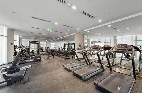 Business Bay Apartment | FIRST CLASS Studio Canal & Burj Khalifa View