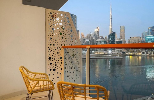 Business Bay Apartment | FIRST CLASS Studio Canal & Burj Khalifa View