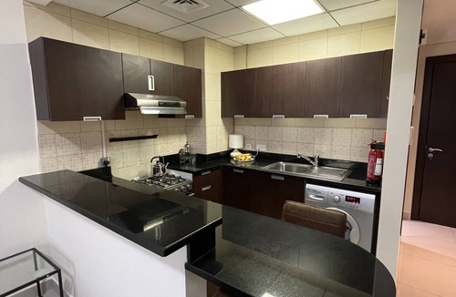 Dubai Sports City Apartment | Golf and Skyline view. Dubai SportCity from 65 USD Parking included