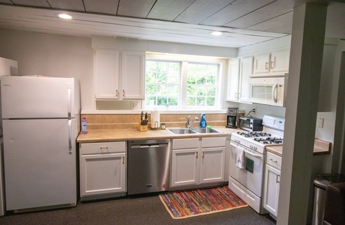 Brookhaven Cottage | Gorgeous Historic Carriage House with fine furnishings and modern amenities