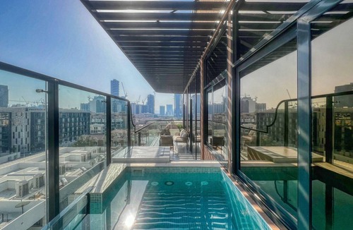Jumeirah Village Circle Apartment | GuestReady - 2BR Earthy Charm | Private Pool | JVC