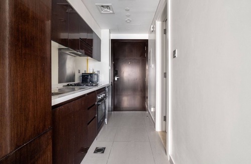 Business Bay Apartment | GuestReady - Luxe Furnished Stay, Pool & Sauna