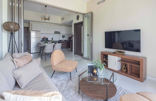 Dubai Apartment | Impressive 1BR with Pool Views in Liwan!