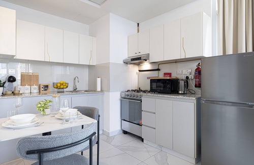 Business Bay Apartment | Luxury Apartment with Panoramic Burj Khalifa & Canal Views and Pool Access