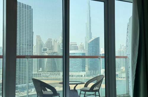 Business Bay Apartment | Modern Studio With Iconic Burj Khalifa & Canal Views