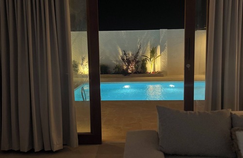 Abu Dhabi Ski Chalet | Mykonos Resort , unforgettable memories with your beloveds .