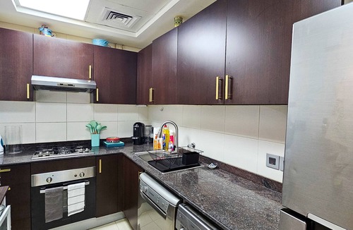 Abu Dhabi Apartment | Ocean Breeze Retreat: Tropical 2-Bedroom Haven with Stunning Sea Views
