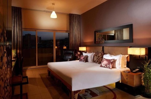 Discovery Gardens Hotel | One Bedroom Apartment In Discovery Gardens By E R