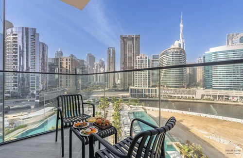 Business Bay Apartment | Réveille Face au Burj Khalifa Vu Canal & Piscine