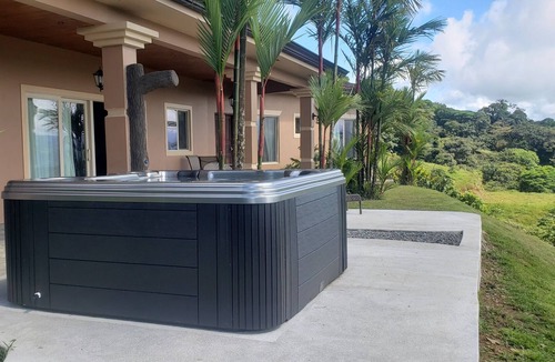 Arenal Villa | Relax in Jacuzzi with panoramic Views of Lake arenal after a day of adventure
