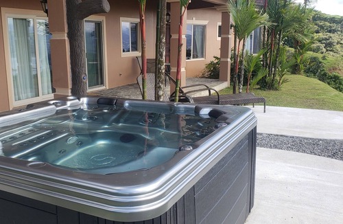 Arenal Villa | Relax in Jacuzzi with panoramic Views of Lake arenal after a day of adventure