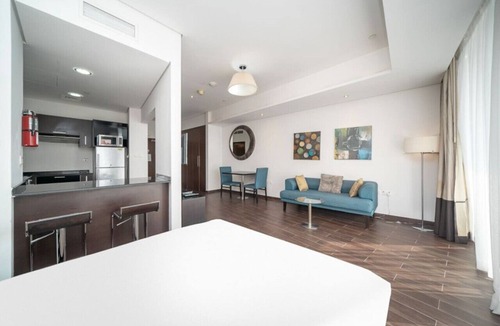 Dubai Sports City Apartment | StoneTree - The Matrix Studio - Spacious Apartment