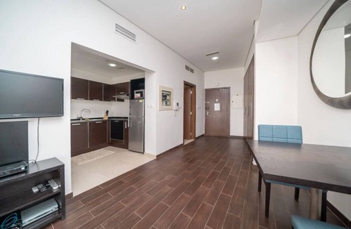 Dubai Sports City Apartment | StoneTree - The Matrix Studio - Spacious Apartment