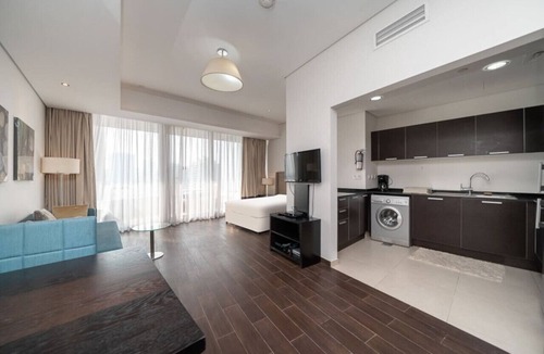 Dubai Sports City Apartment | StoneTree - The Matrix Studio - Spacious Apartment