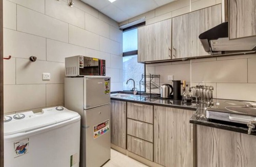 Falaj al Moalla Apartment | The Living