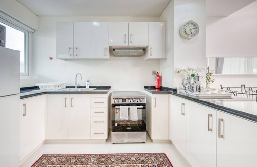 Dubai Ski Chalet | Tranquil 3BR Townhouse at Albizia Damac Hills 2 by Deluxe Holiday Homes