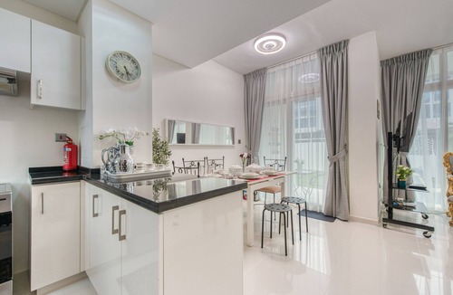 Dubai Ski Chalet | Tranquil 3BR Townhouse at Albizia Damac Hills 2 by Deluxe Holiday Homes