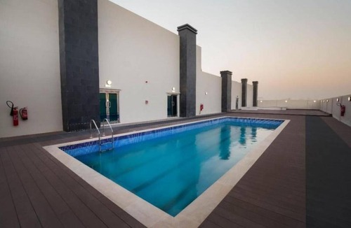 Dubai Investment Park House | Two Bedroom Apartment Near Dunes Village Dip By Luxury Bookings