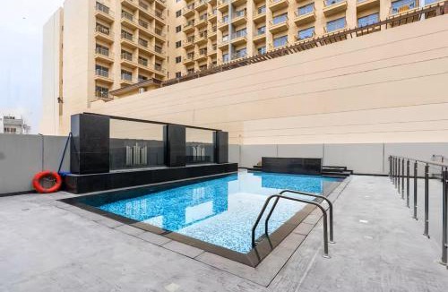 Jumeirah Village Circle Apartment | Vogue Vacation Homes, JVC Al Serh Residences Near Circle Mall, One Bedroom Apartment with Balcony and City View, Access to all Amenities