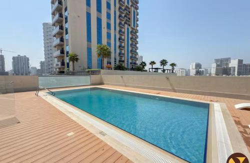 Jumeirah Village Circle Apartment | Vogue Vacation Homes, JVC Jeewar Tower near Circle Mall, One Bedroom Apartment with Balcony and City View, Access to all Amenities